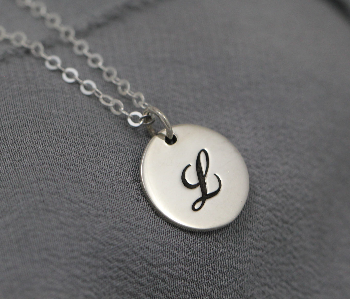 Sterling silver cursive initial necklace